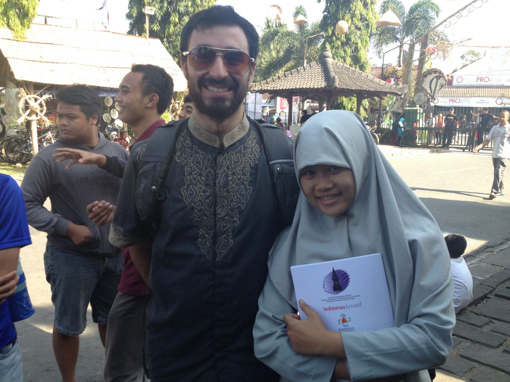 Max obliging sweet Indonesian student requesting his photo at Borobudor.  